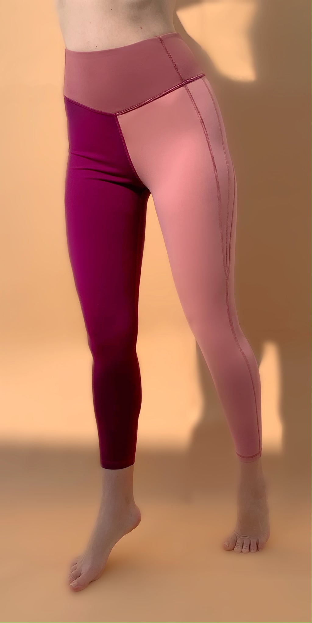 Color-block, split leg butter soft leggings in pink, mauve and burgundy
